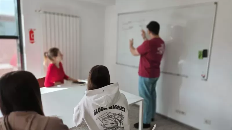 Internal BigConvert training at the whiteboard in the meeting room